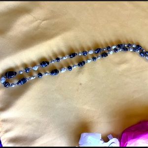 Long black, white and silver necklace